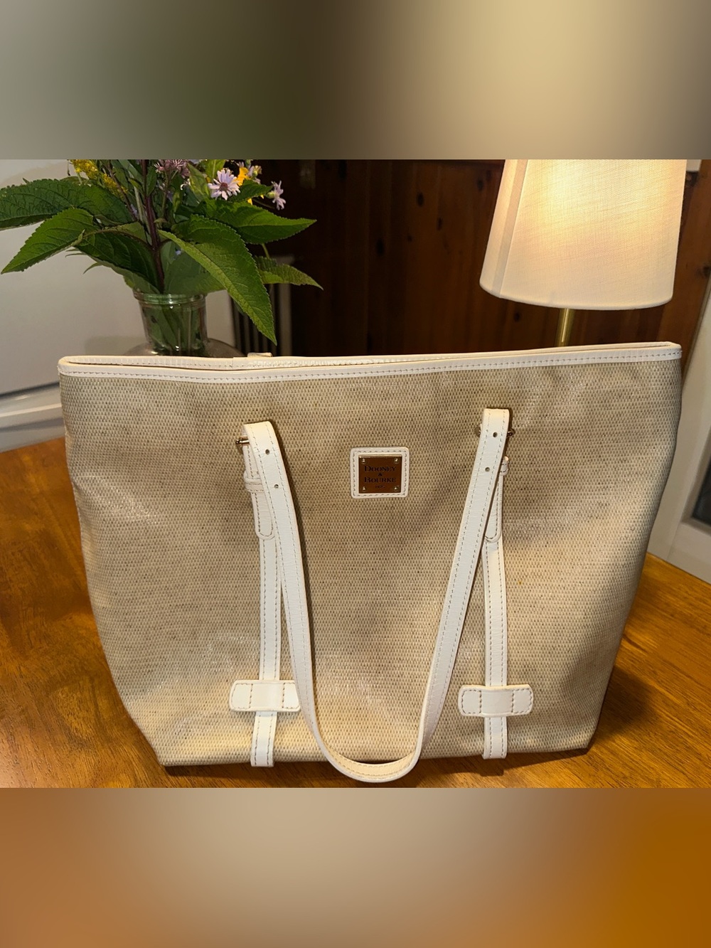 Dooney & Bourke Beige Tote with White Trim and Gold Plaque